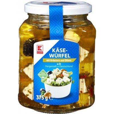 Сыр Käse-Würfel mit Kräutern und Oliven